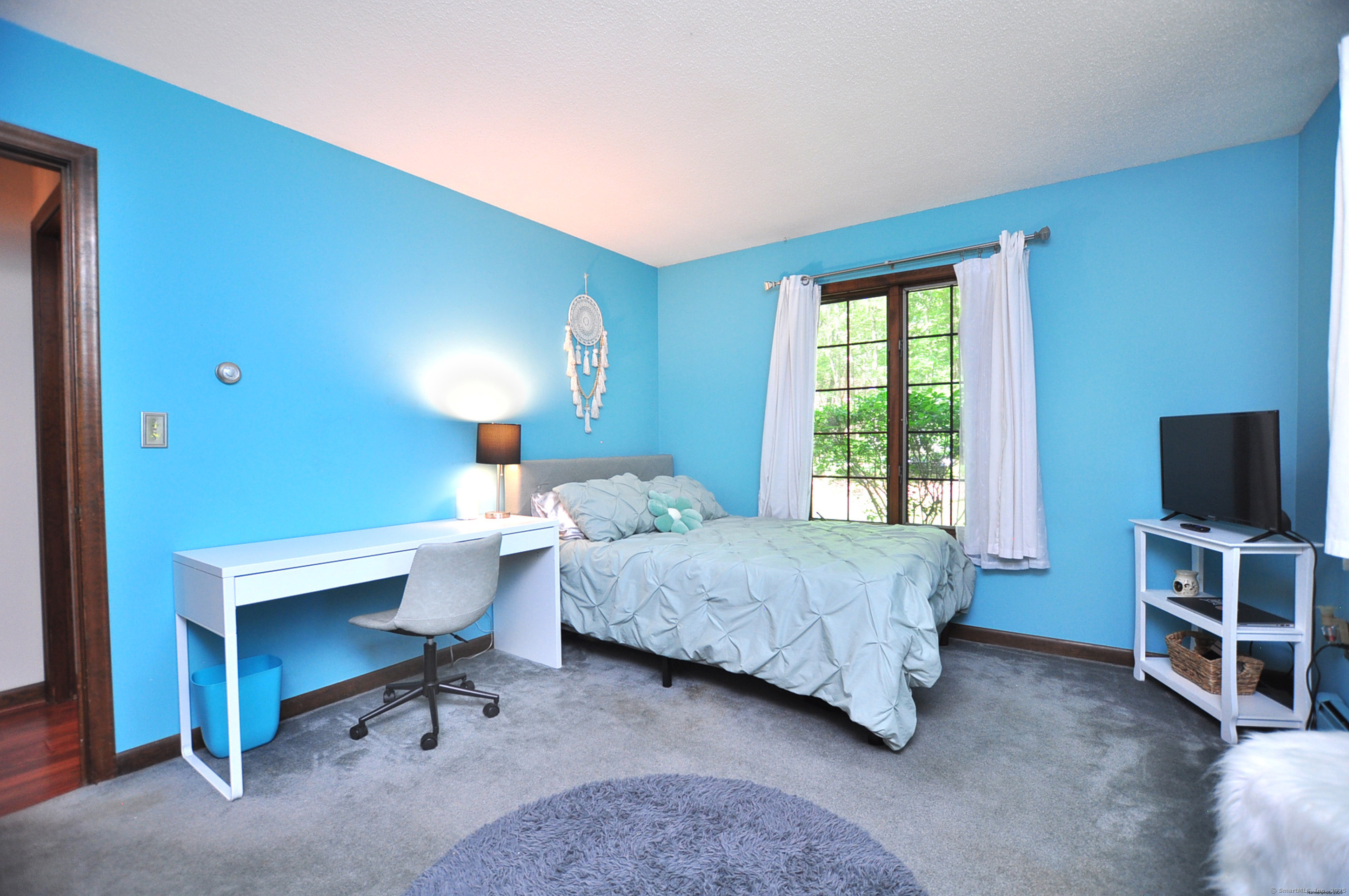 18 Fiano Road Bolton, CT 06043 - Photo 25 of 38 a bedroom with a bed and a window