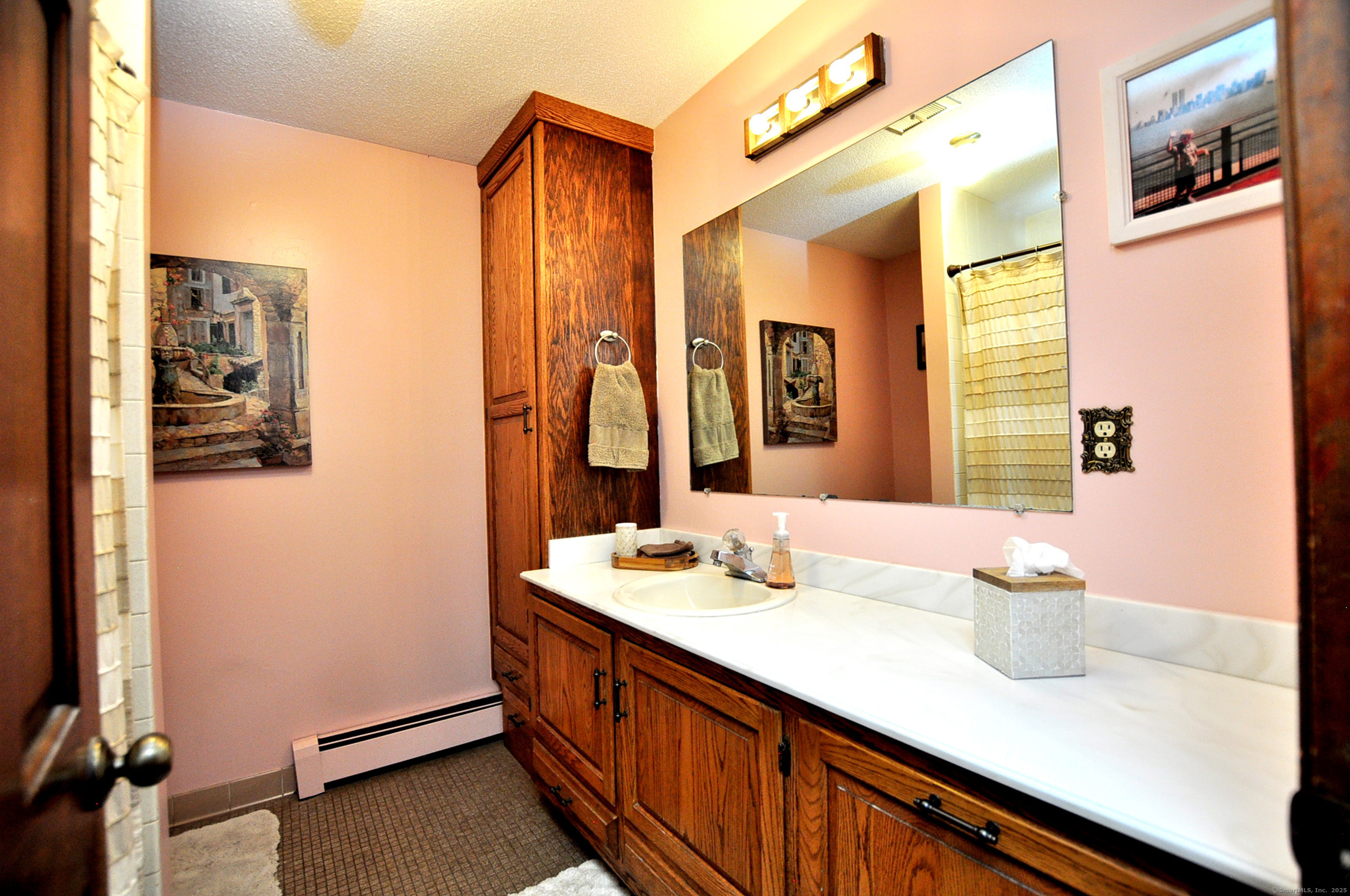 18 Fiano Road Bolton, CT 06043 - Photo 28 of 38 a bathroom with a sink and a mirror
