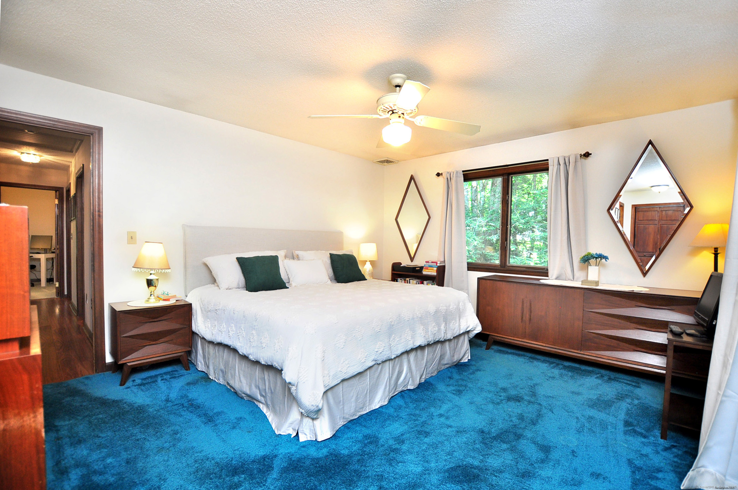 18 Fiano Road Bolton, CT 06043 - Photo 30 of 38 a spacious bedroom with a bed and a window
