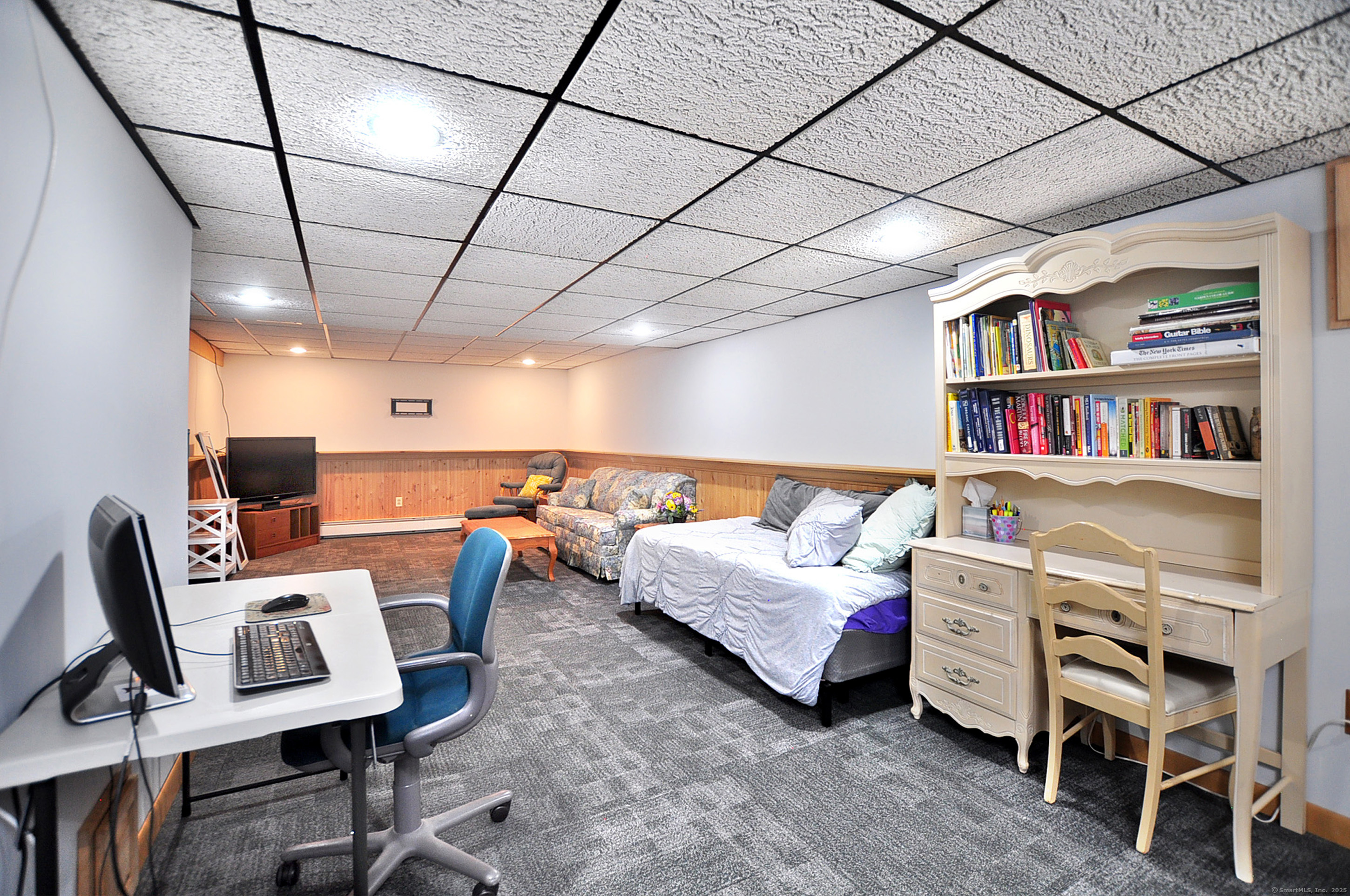 18 Fiano Road Bolton, CT 06043 - Photo 34 of 38 a living room with furniture gym equipment and a rug