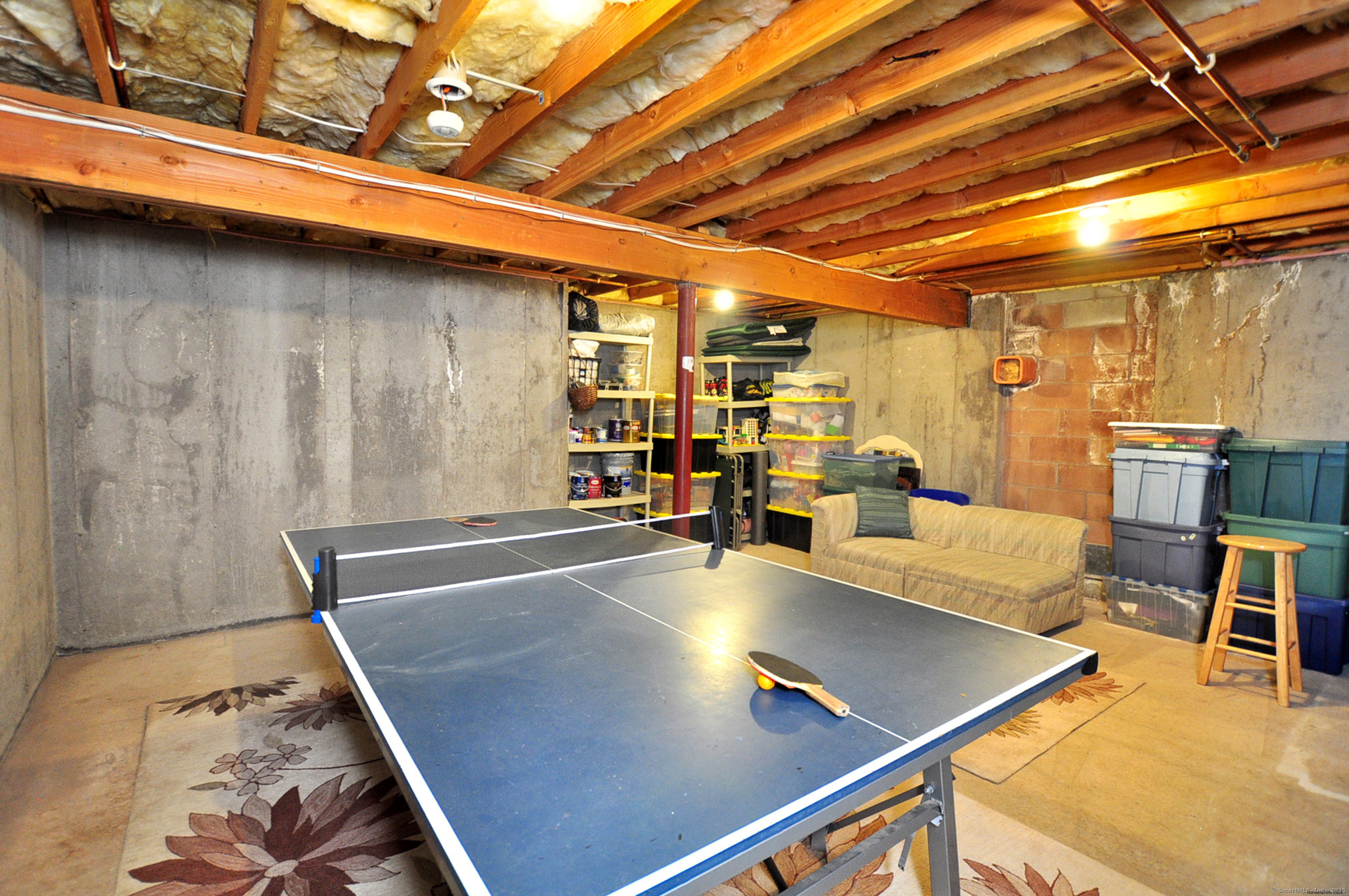 18 Fiano Road Bolton, CT 06043 - Photo 35 of 38 a room with stainless steel appliances table and chairs