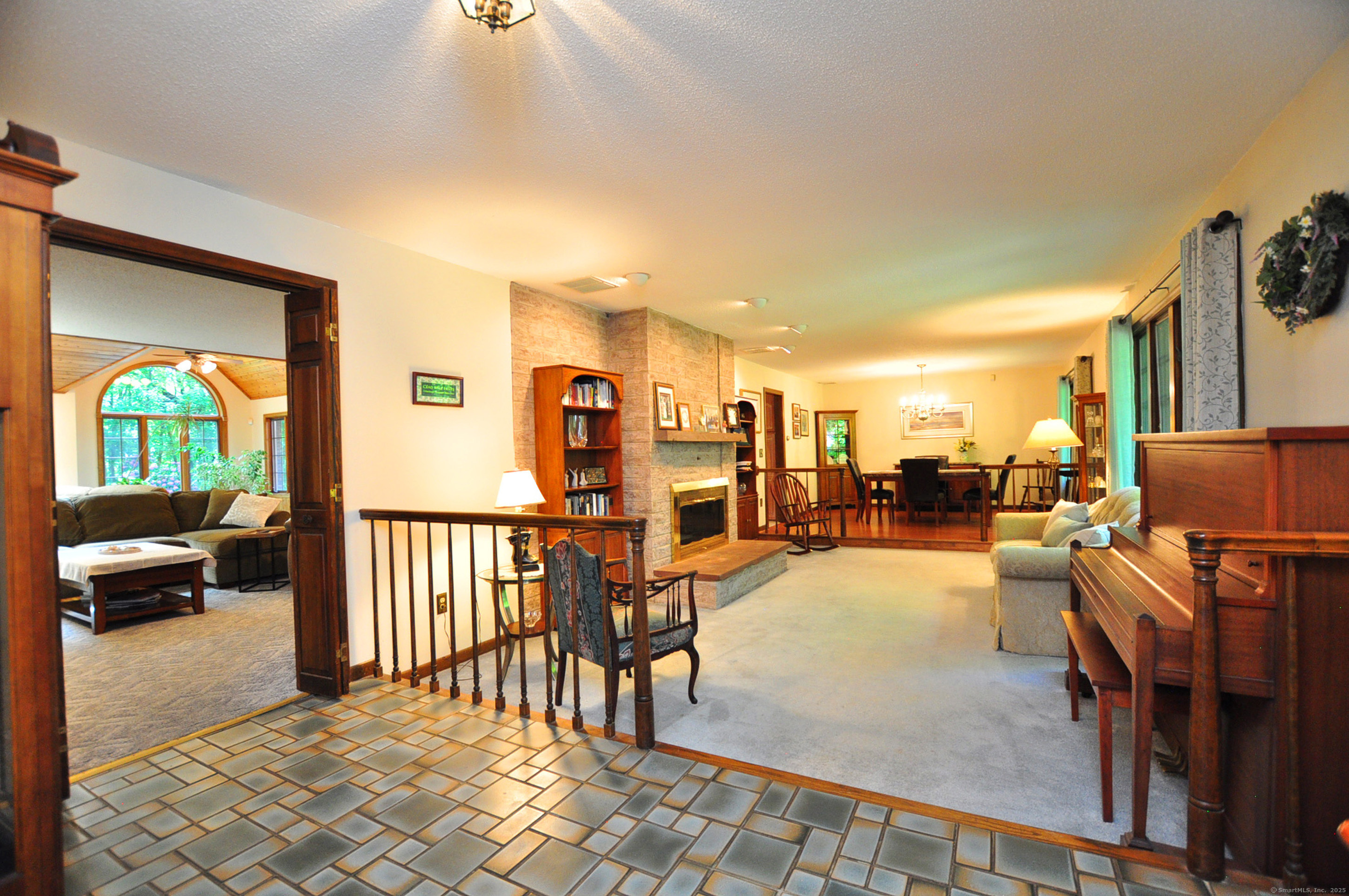 18 Fiano Road Bolton, CT 06043 - Photo 6 of 38 a view of a livingroom with furniture and front door