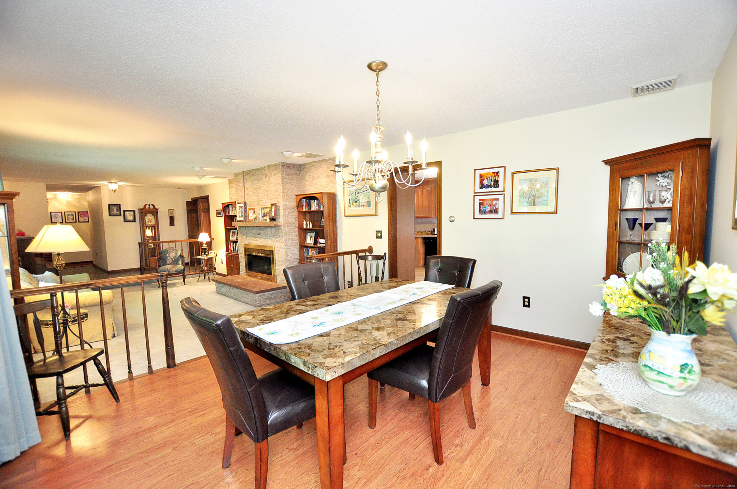 18 Fiano Road Bolton, CT 06043 - Photo 10 of 38 a view of a dining room with furniture window and wooden floor
