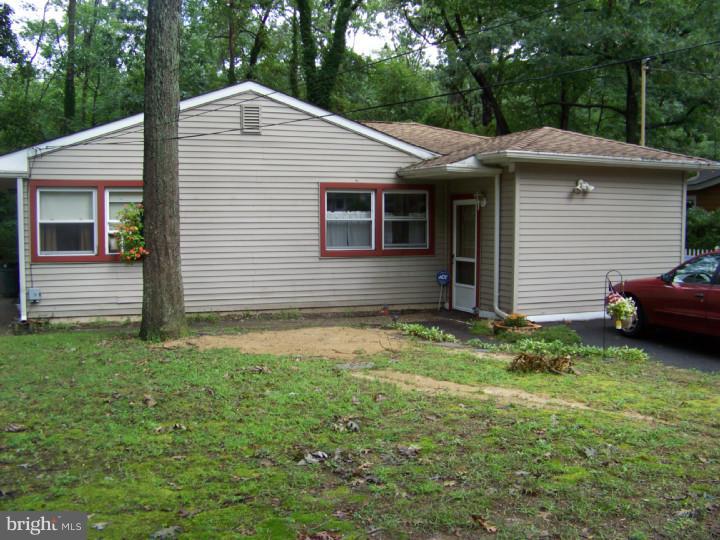 327 Evergreen Road Mount Laurel, NJ 08054 - Photo 2 of 17 a view of a house with a yard