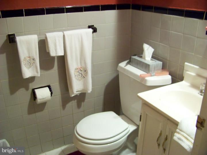 327 Evergreen Road Mount Laurel, NJ 08054 - Photo 13 of 17 a white toilet sitting next to a bathroom sink