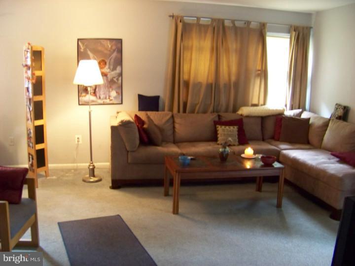 327 Evergreen Road Mount Laurel, NJ 08054 - Photo 6 of 17 a living room with furniture and a large window