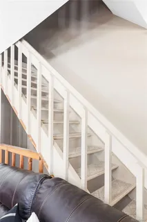a view of a living room with a balcony