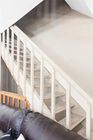 a view of a living room with a balcony