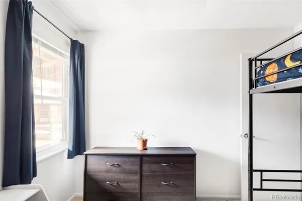 a view of a hallway with workspace