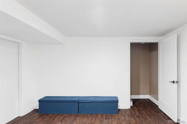 a view of bedroom and closet