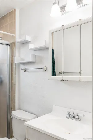 a bathroom with a sink and a toilet