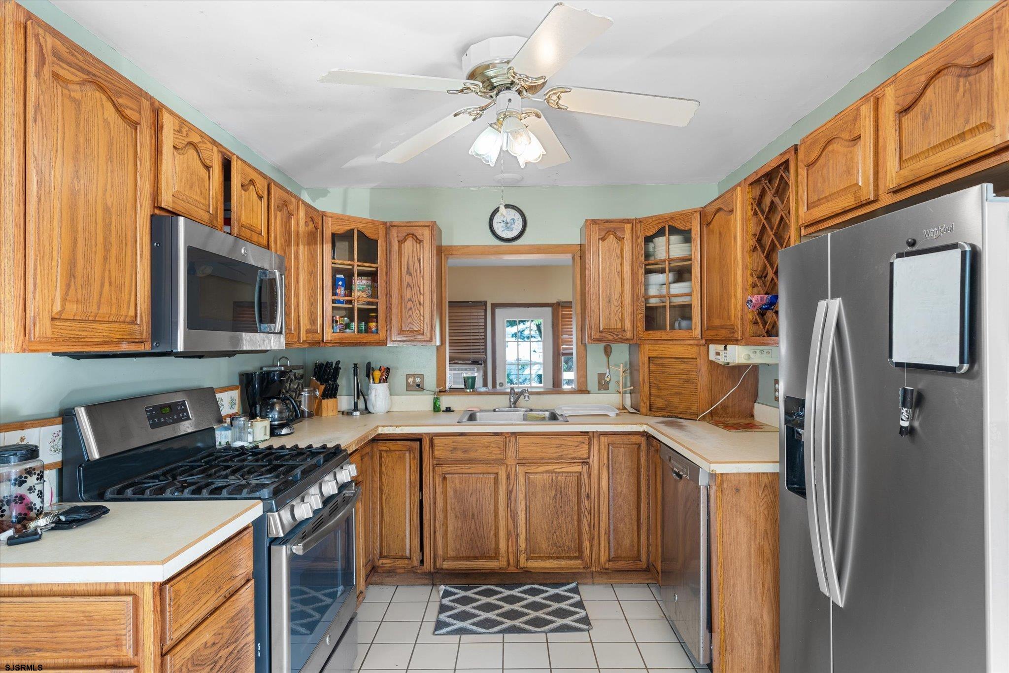 308 Pine Street Absecon, NJ 08201 - Photo 11 of 35 a kitchen with a sink stove and refrigerator