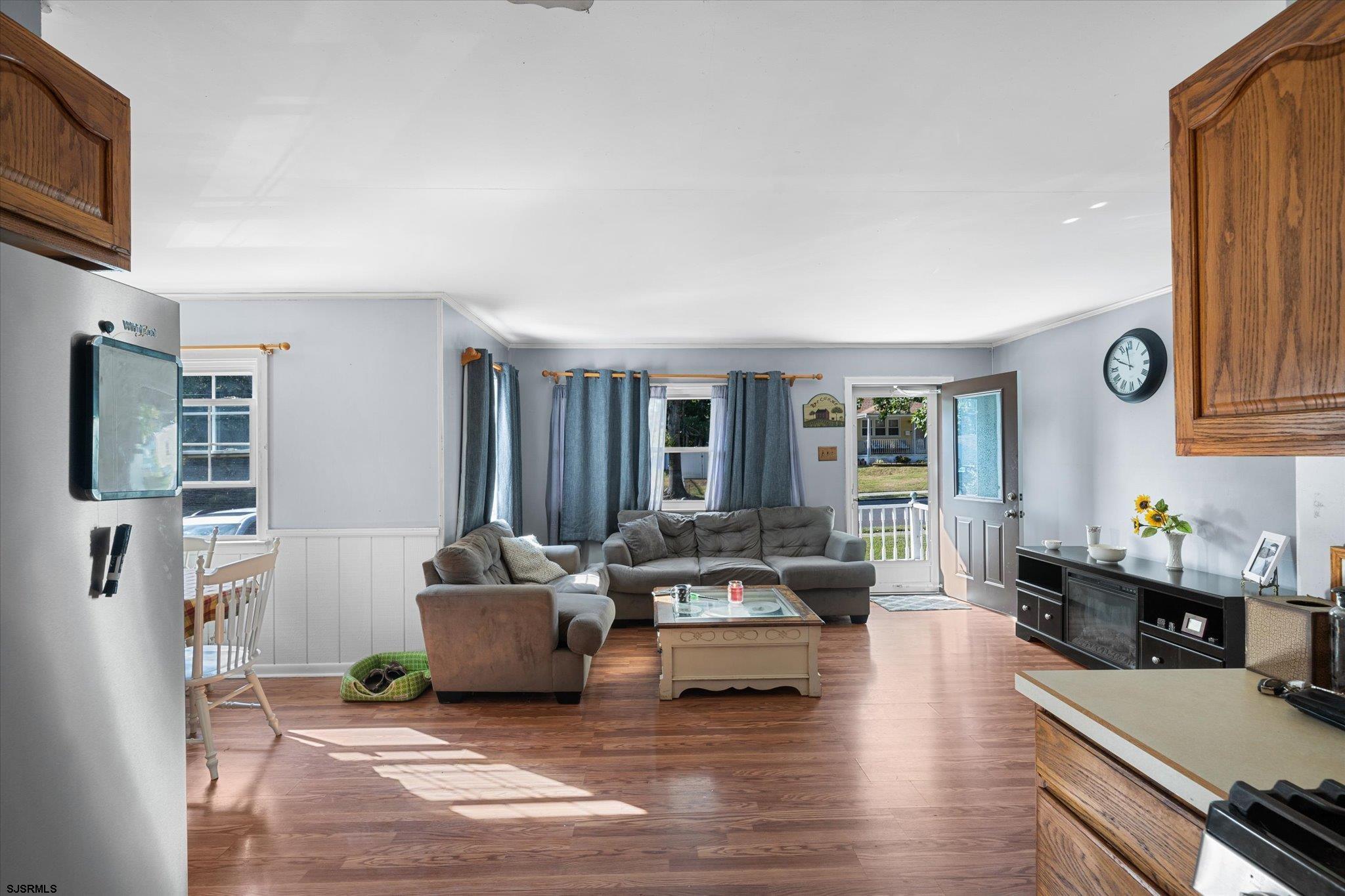 308 Pine Street Absecon, NJ 08201 - Photo 14 of 35 a living room with furniture and a flat screen tv
