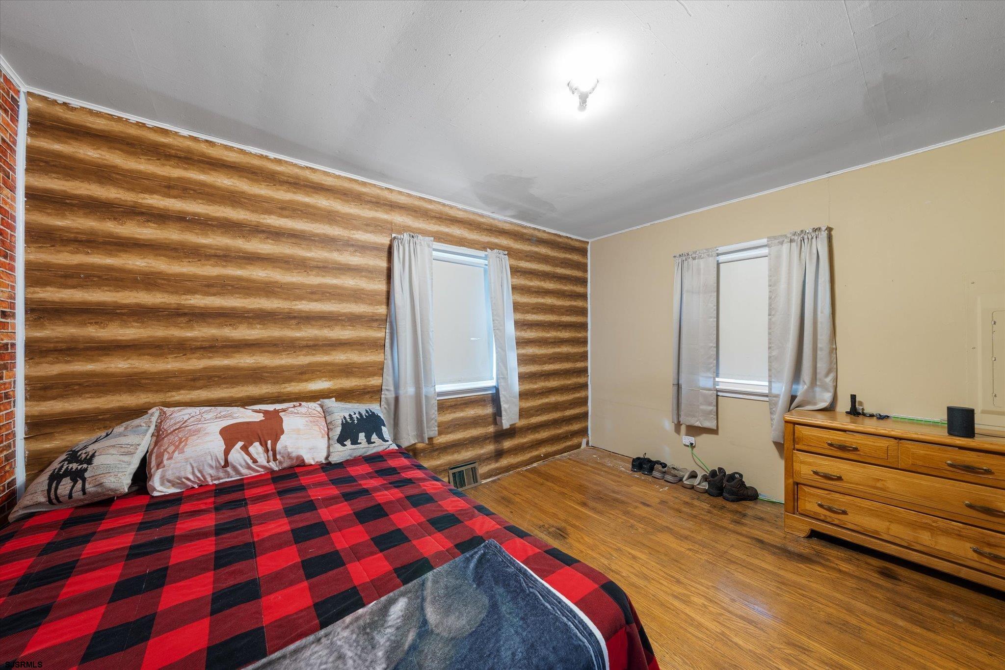 308 Pine Street Absecon, NJ 08201 - Photo 16 of 35 a bedroom with a bed and a window