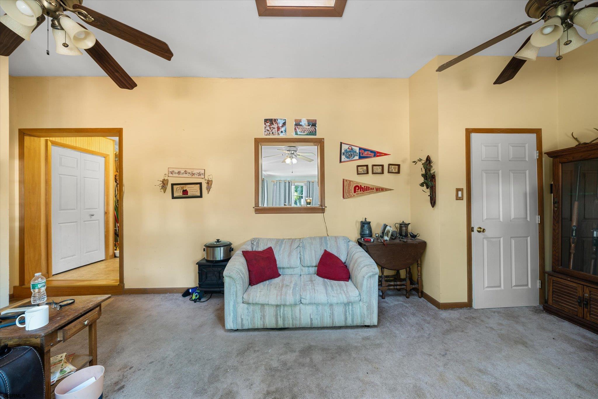 308 Pine Street Absecon, NJ 08201 - Photo 26 of 35 a living room with a bed and gym equipment