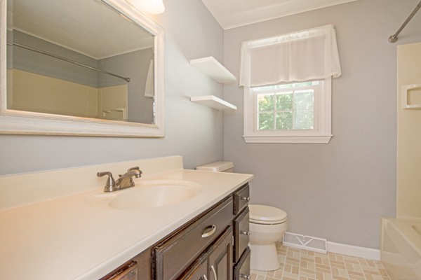 146 Mason Road Northbridge, MA 01588 - Photo 20 of 30 a bathroom with a sink a toilet and with mirror