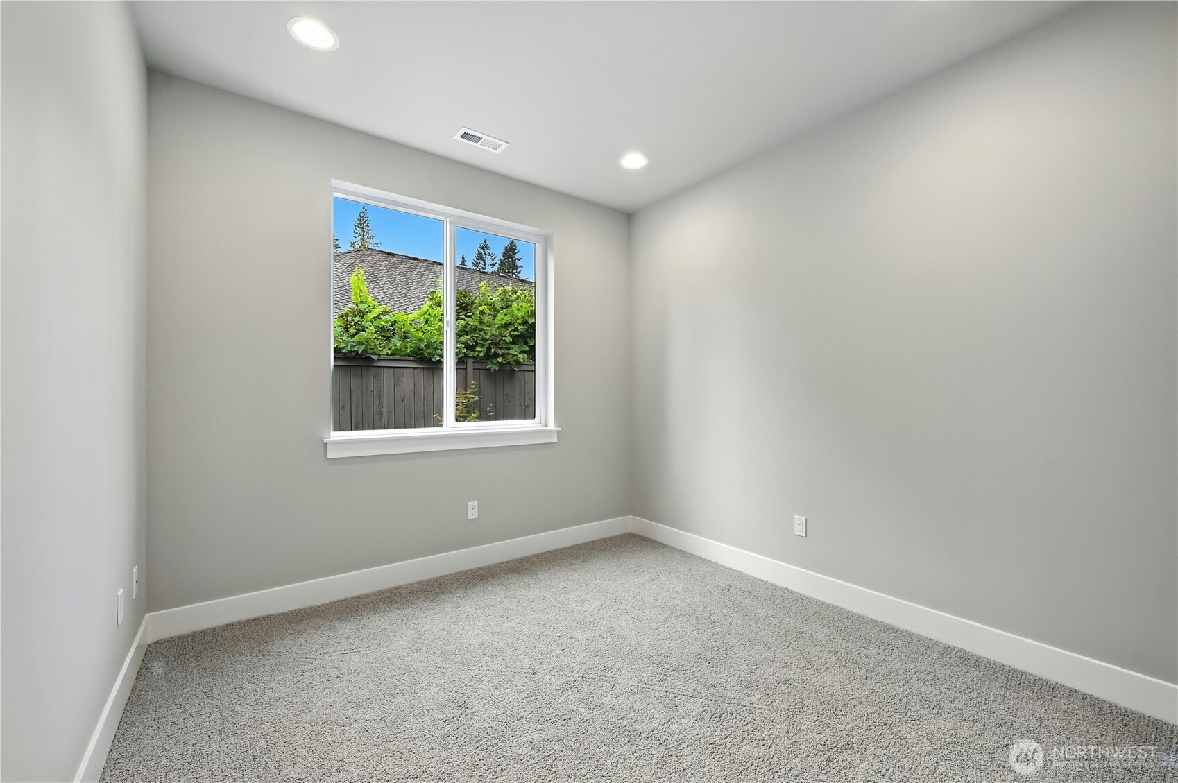 19225 Meridian Drive Southeast, Unit CW 15 Bothell, WA 98012 - Photo 13 of 31 an empty room with windows