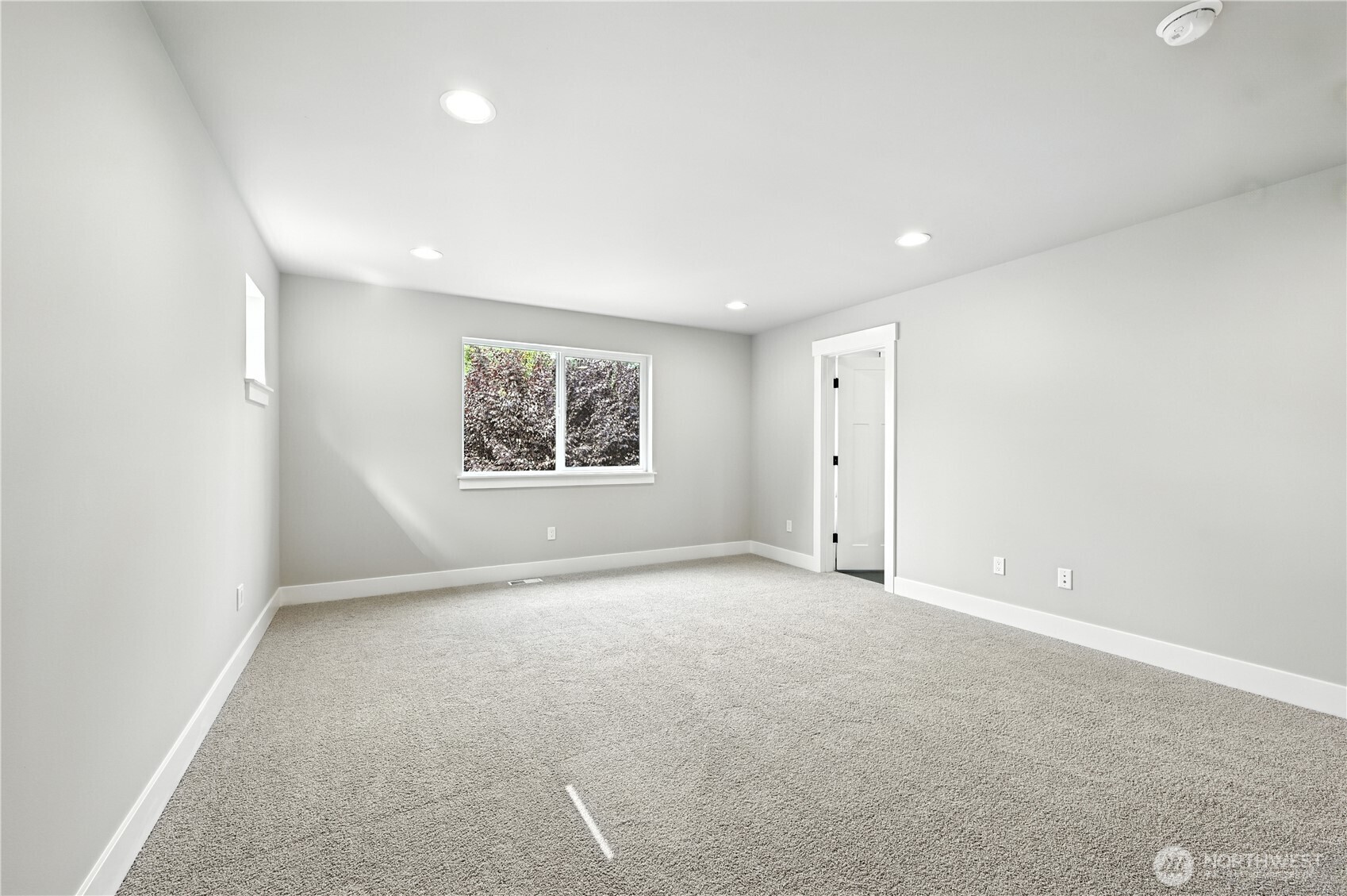 19225 Meridian Drive Southeast, Unit CW 15 Bothell, WA 98012 - Photo 18 of 31 an empty room with windows