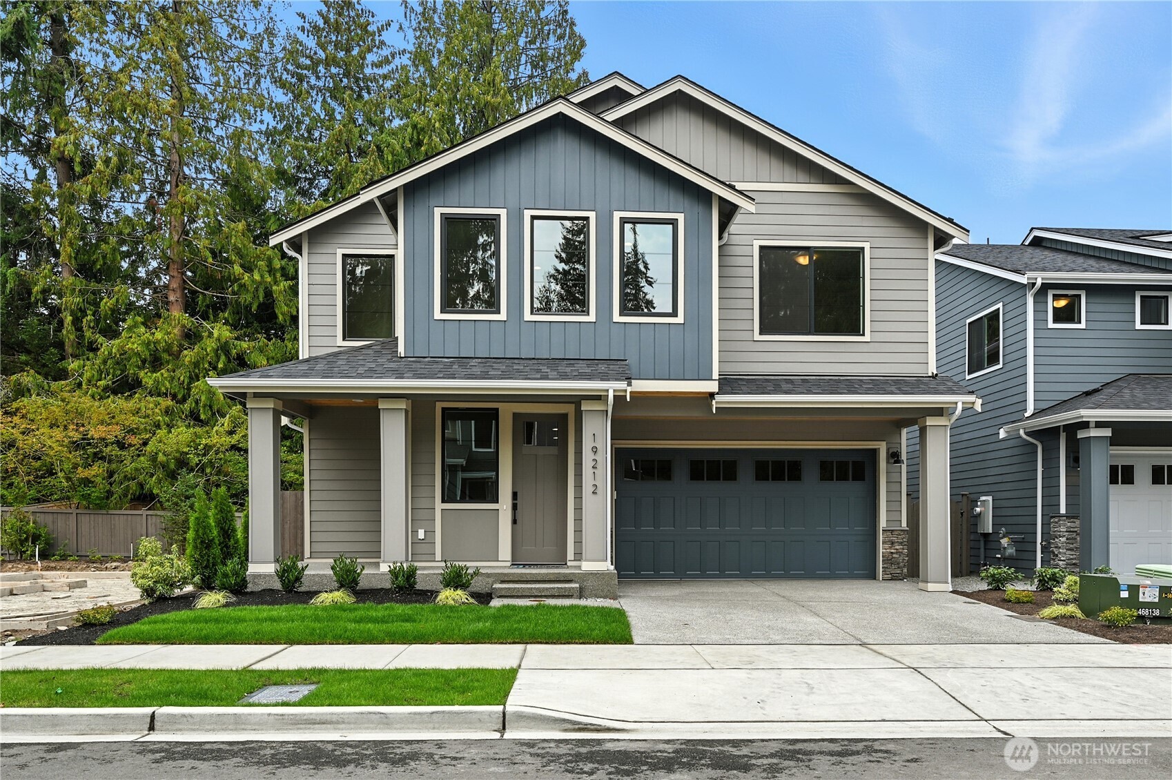 19225 Meridian Drive Southeast, Unit CW 15 Bothell, WA 98012 - Photo 2 of 31 a front view of a house with a garden and plants