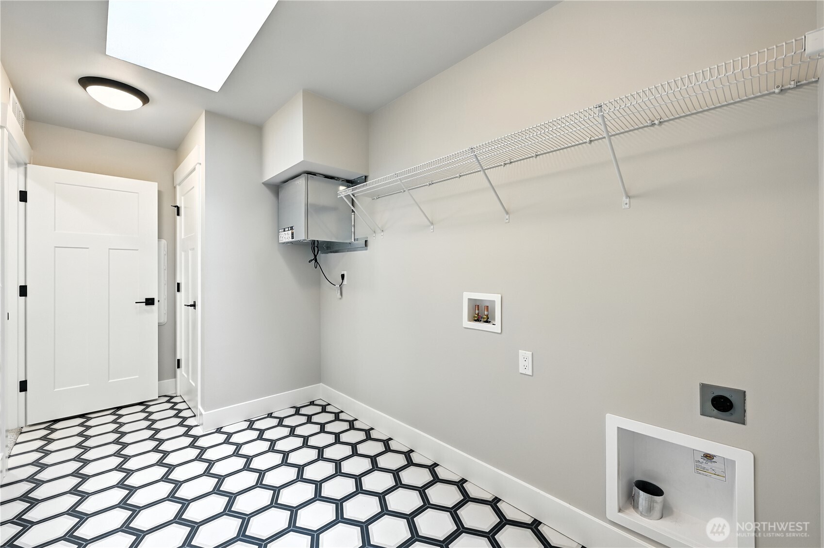 19225 Meridian Drive Southeast, Unit CW 15 Bothell, WA 98012 - Photo 23 of 31 a bedroom with a bed and a bathroom