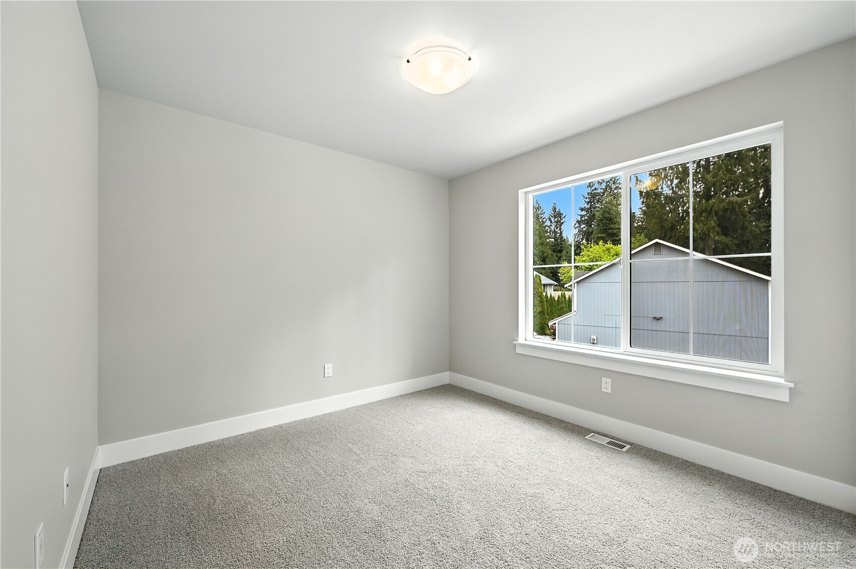 19225 Meridian Drive Southeast, Unit CW 15 Bothell, WA 98012 - Photo 28 of 31 an empty room with a window