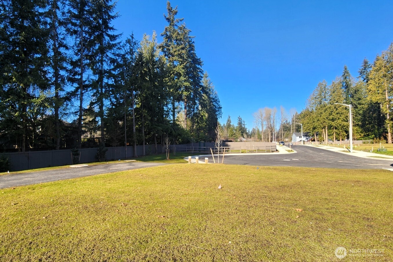 19225 Meridian Drive Southeast, Unit CW 15 Bothell, WA 98012 - Photo 29 of 31 a view of a swimming pool with an outdoor space and seating area