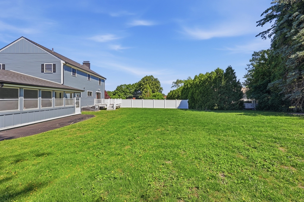 105 Stafford Road Lowell, MA 01852 - Photo 42 of 42 a view of a house with a backyard