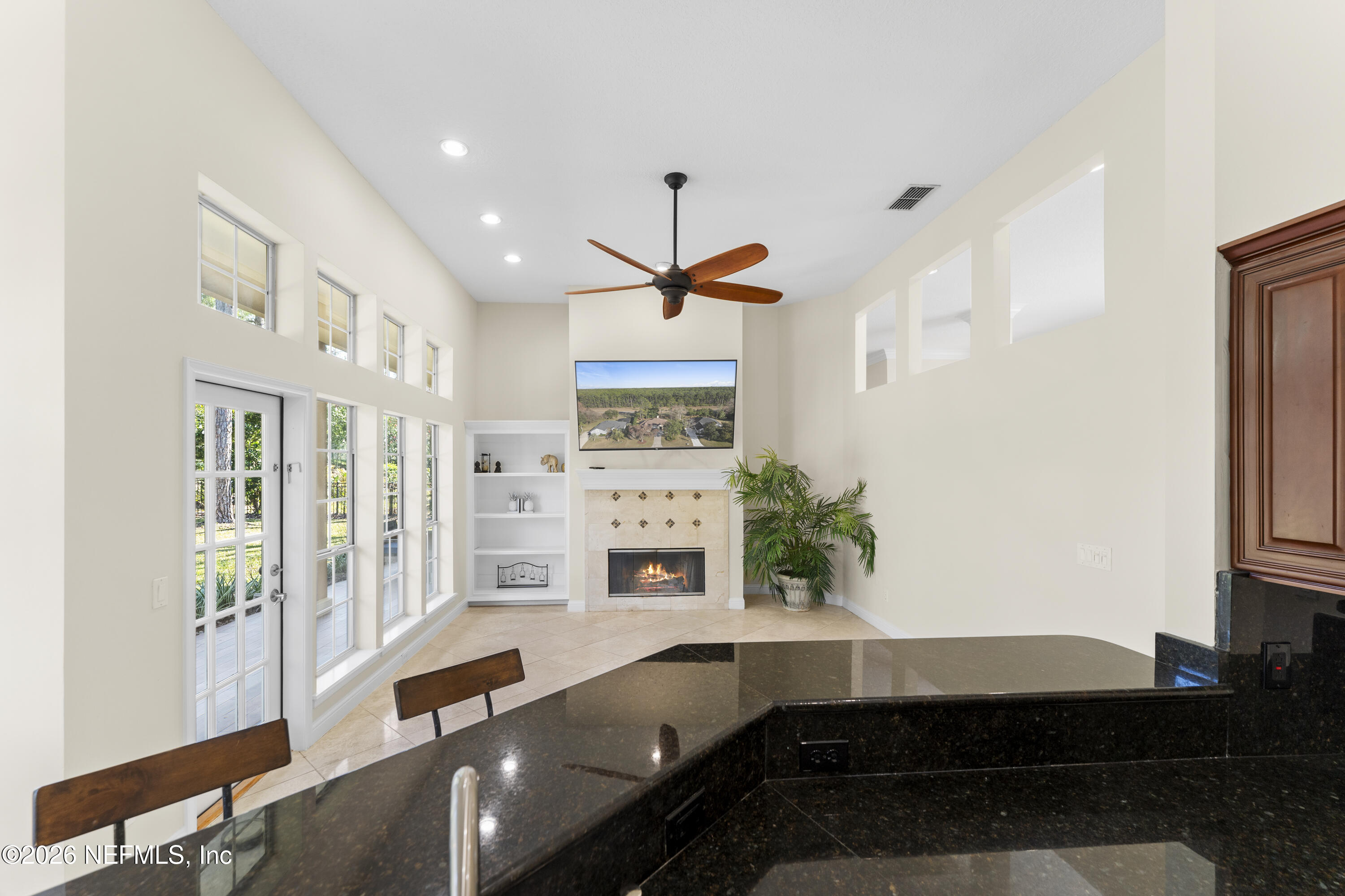 9957 Chelsea Lake Road Jacksonville, FL 32256 - Photo 20 of 73 a kitchen with stainless steel appliances granite countertop a sink and a stove