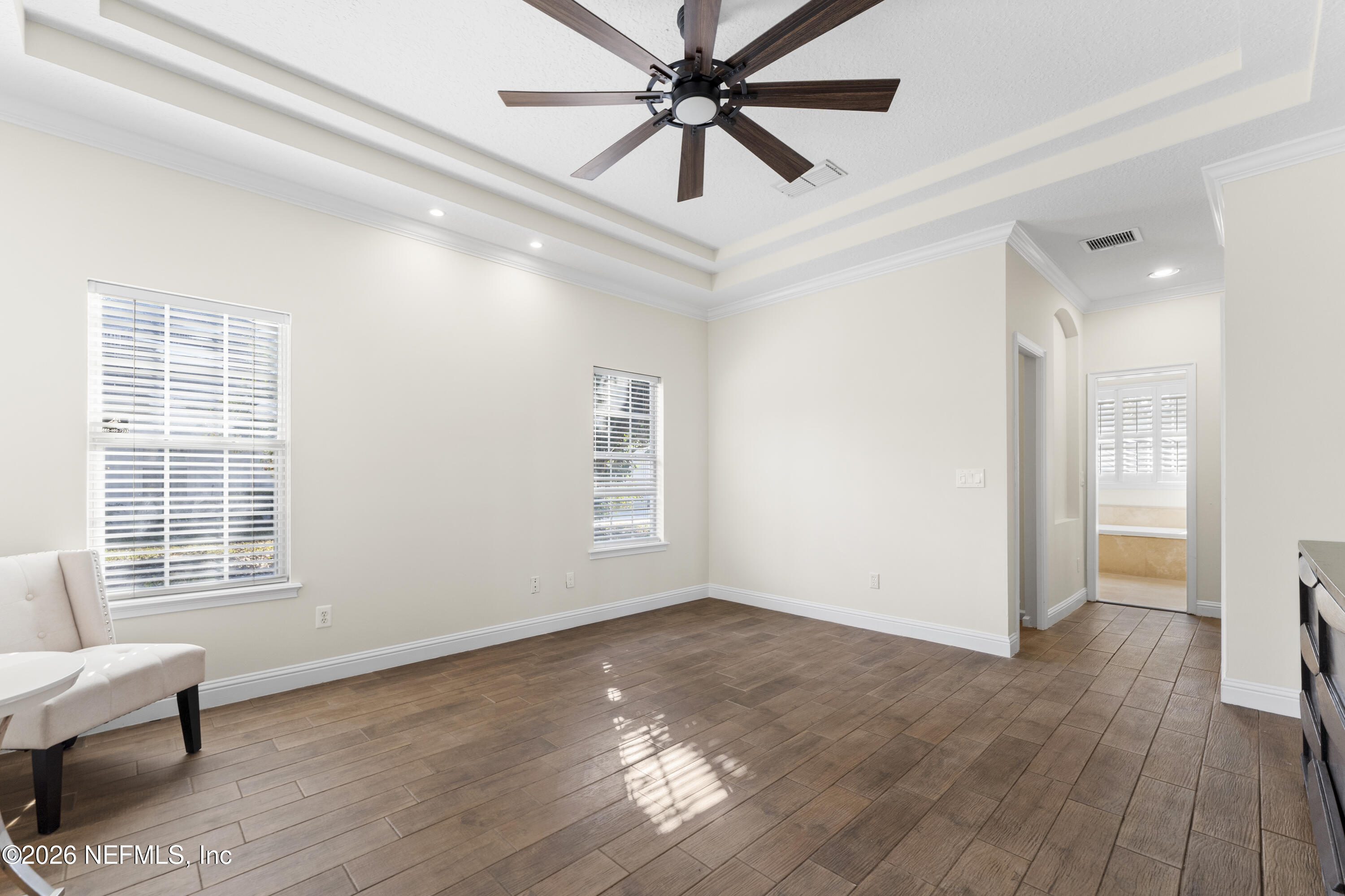 9957 Chelsea Lake Road Jacksonville, FL 32256 - Photo 24 of 73 a view of a livingroom with a ceiling fan and window