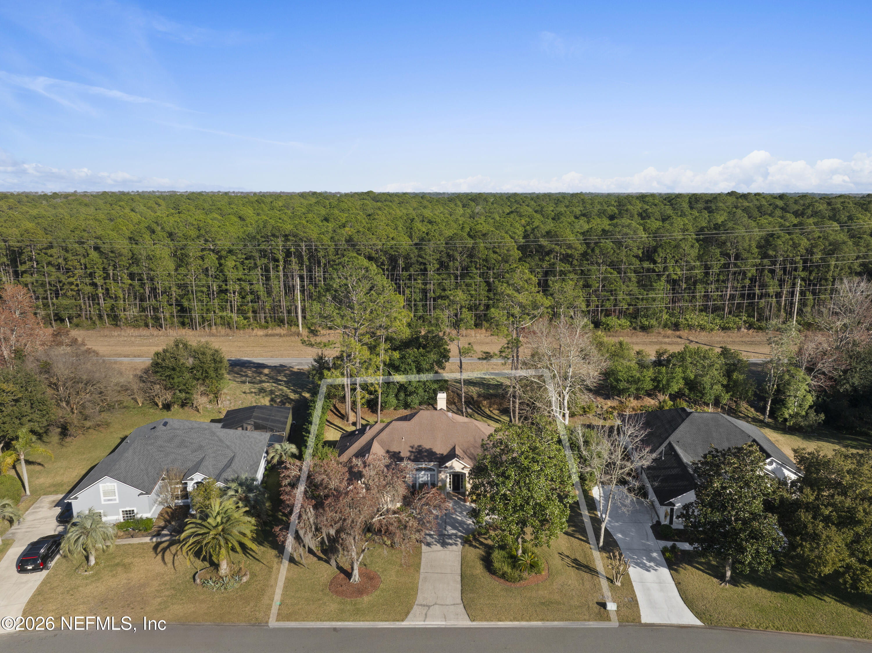 9957 Chelsea Lake Road Jacksonville, FL 32256 - Photo 3 of 73 an aerial view of a city with lots of residential buildings