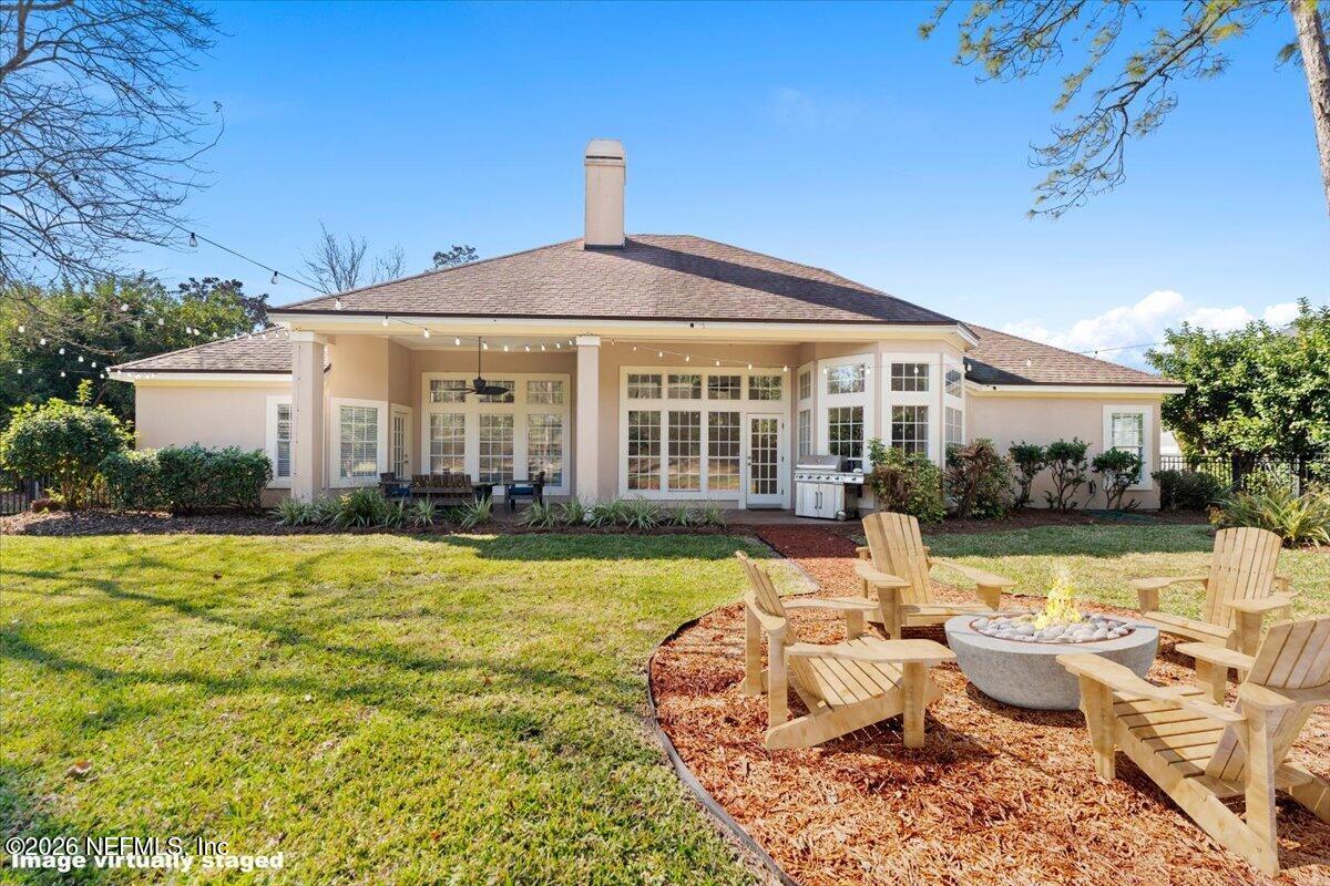 9957 Chelsea Lake Road Jacksonville, FL 32256 - Photo 37 of 73 a very nice looking house with swimming pool in front of it