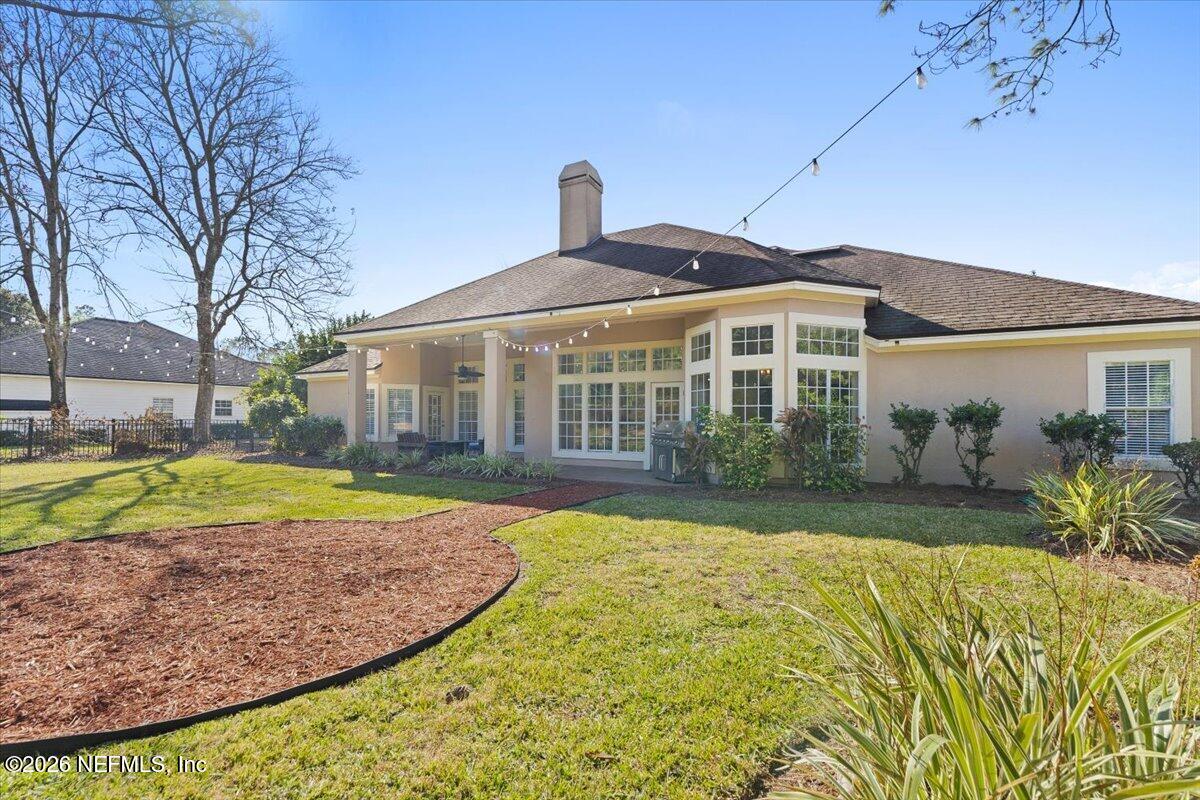 9957 Chelsea Lake Road Jacksonville, FL 32256 - Photo 38 of 73 a view of a house with swimming pool