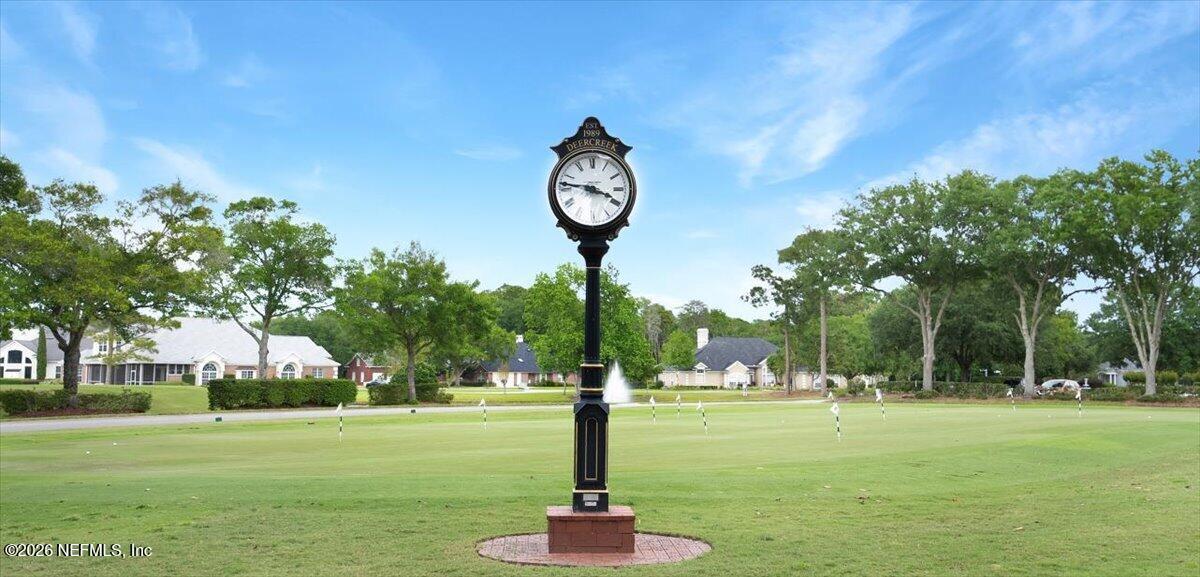 9957 Chelsea Lake Road Jacksonville, FL 32256 - Photo 47 of 73 a park with large trees and a clock