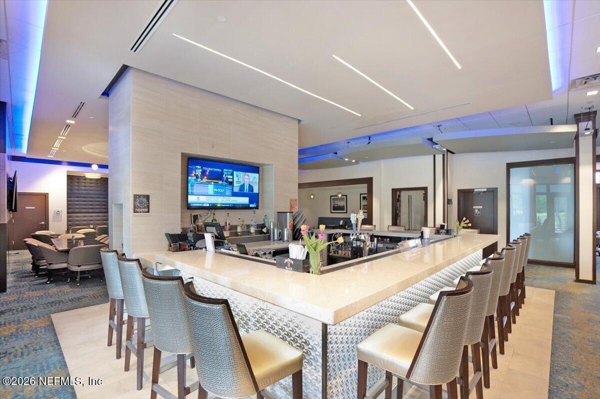 9957 Chelsea Lake Road Jacksonville, FL 32256 - Photo 54 of 73 a view of a dining room with furniture