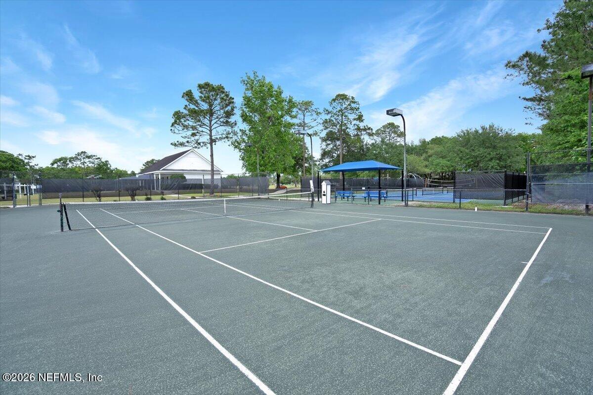 9957 Chelsea Lake Road Jacksonville, FL 32256 - Photo 60 of 73 a view of a tennis court