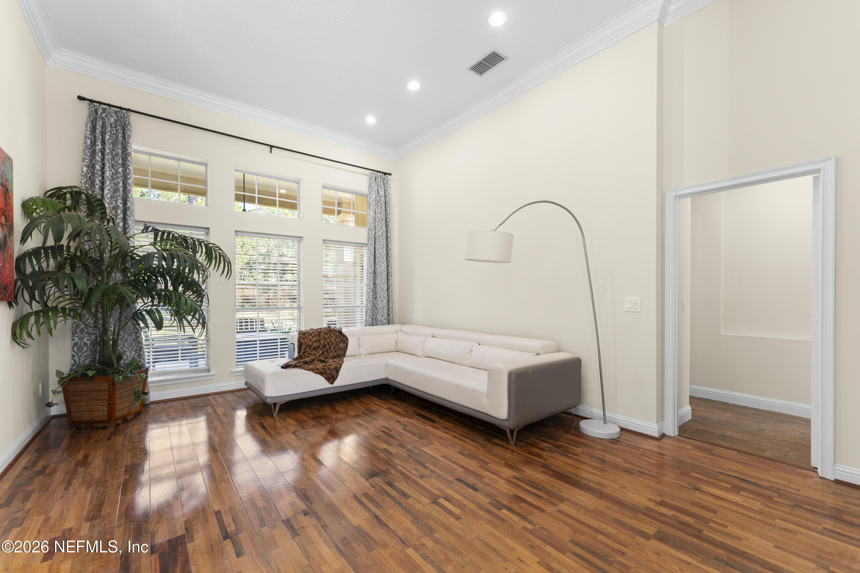 9957 Chelsea Lake Road Jacksonville, FL 32256 - Photo 6 of 73 a living room with furniture and a large window
