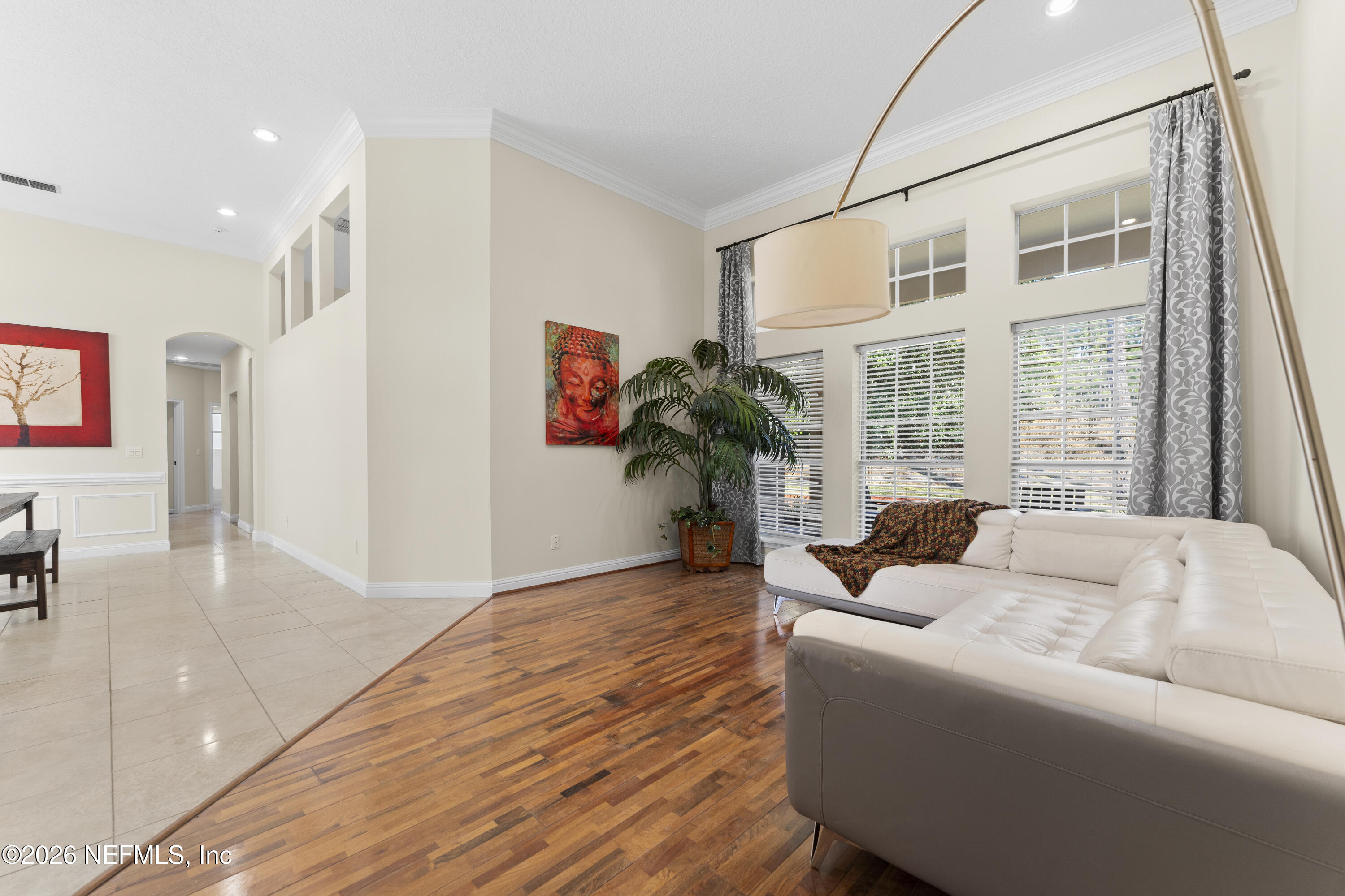 9957 Chelsea Lake Road Jacksonville, FL 32256 - Photo 8 of 73 a living room with furniture and a large window
