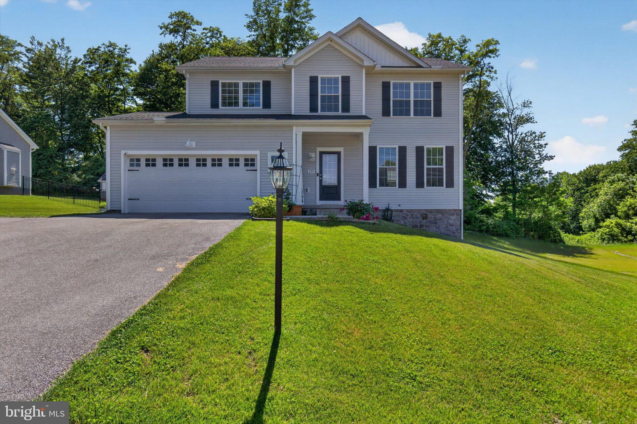 255 Kinneman Road Abbottstown, PA 17301 - Photo 1 of 39 Charming home with lush green surroundings.