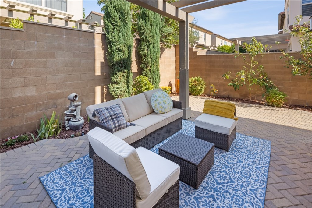 107 Overbrook Irvine, CA 92620 - Photo 24 of 47 a view of a patio with couches and a table