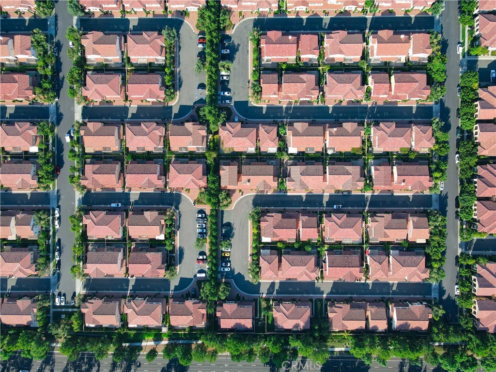 107 Overbrook Irvine, CA 92620 - Photo 32 of 47 a building view with balcony and patio