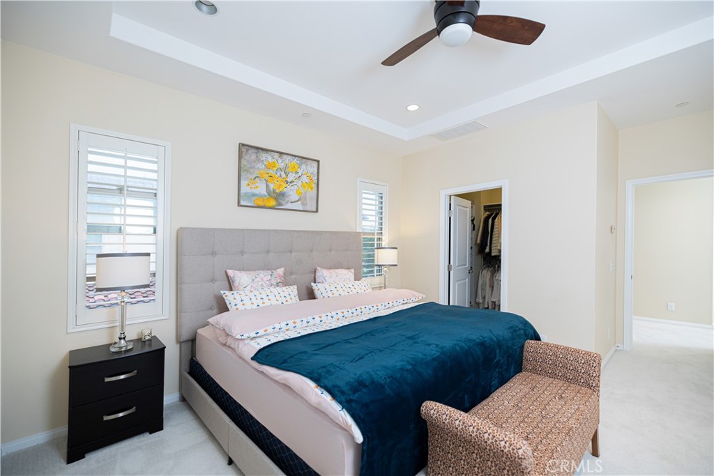 107 Overbrook Irvine, CA 92620 - Photo 47 of 47 a bedroom with a bed and a television