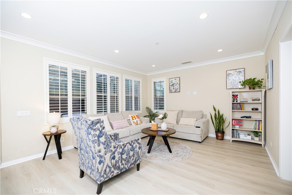 107 Overbrook Irvine, CA 92620 - Photo 5 of 47 a living room with furniture and a large window