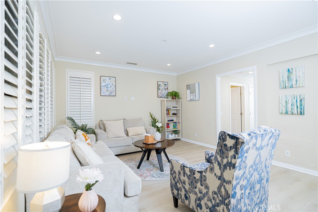 107 Overbrook Irvine, CA 92620 - Photo 8 of 47 a living room with furniture and a large window