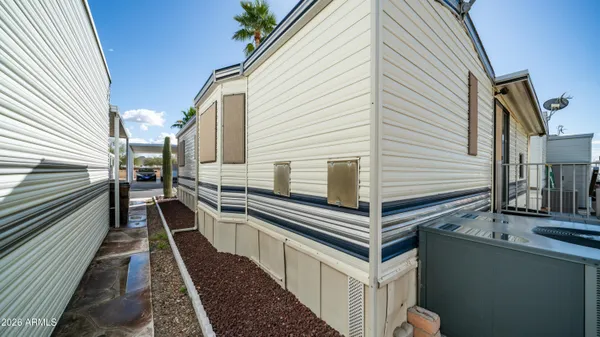 a kitchen with a refrigerator sink stove and cabinets