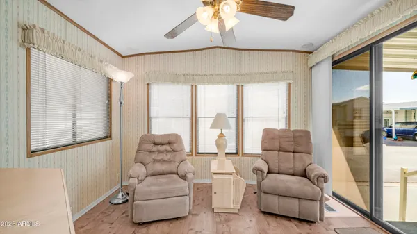 a view of an empty room with a window