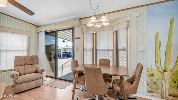 a bathroom with a double vanity sink toilet and a mirror