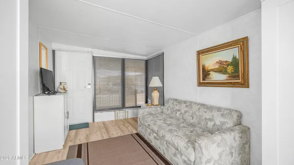 a front view of a building with outdoor seating