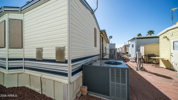 a kitchen with stainless steel appliances a stove microwave and a refrigerator