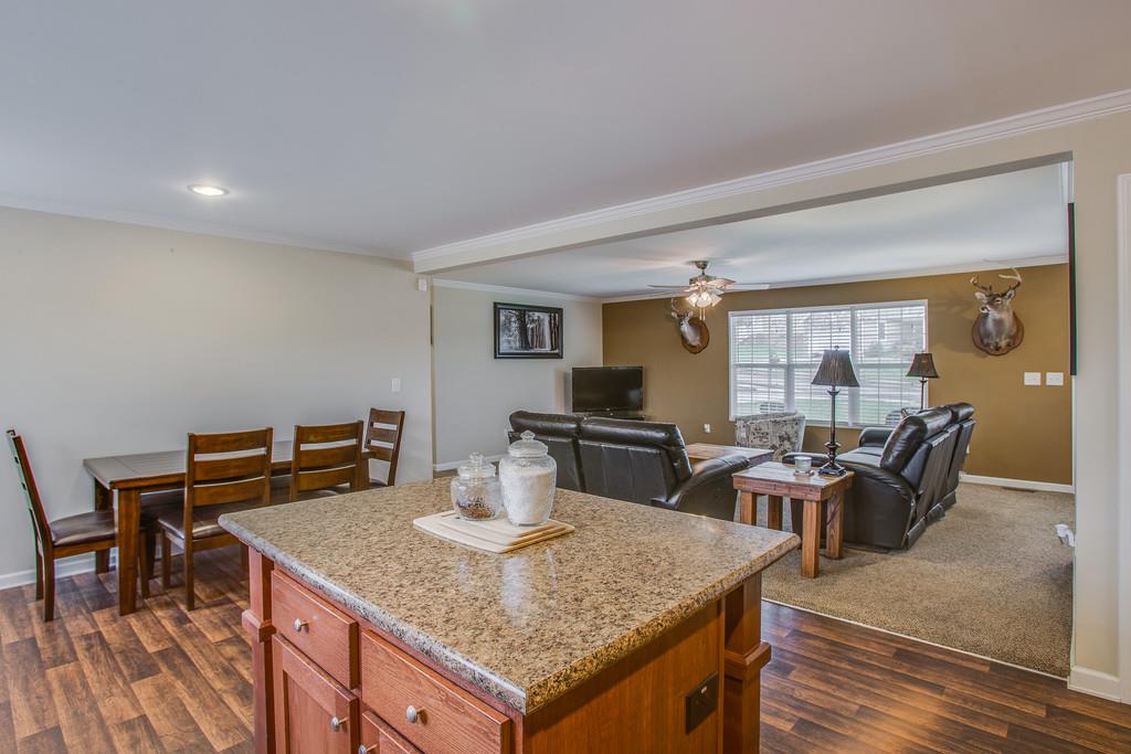 1142 Wrights Mill Road Spring Hill, TN 37174 - Photo 13 of 30 a kitchen with a table and chairs in it