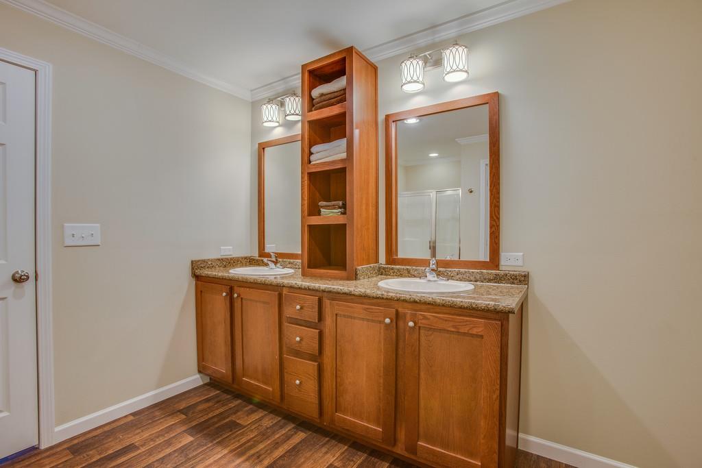 1142 Wrights Mill Road Spring Hill, TN 37174 - Photo 20 of 30 a view of a bathroom with sink and mirror